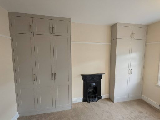 Bespoke Shaker Wardrobes Around a Feature Fireplace
